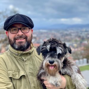 Me and Atlas, my Schnauzer, with Ljubljana in the background